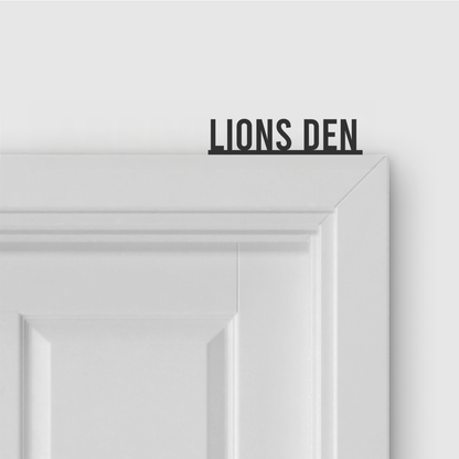 LIONS DEN door topper in Condensed font style