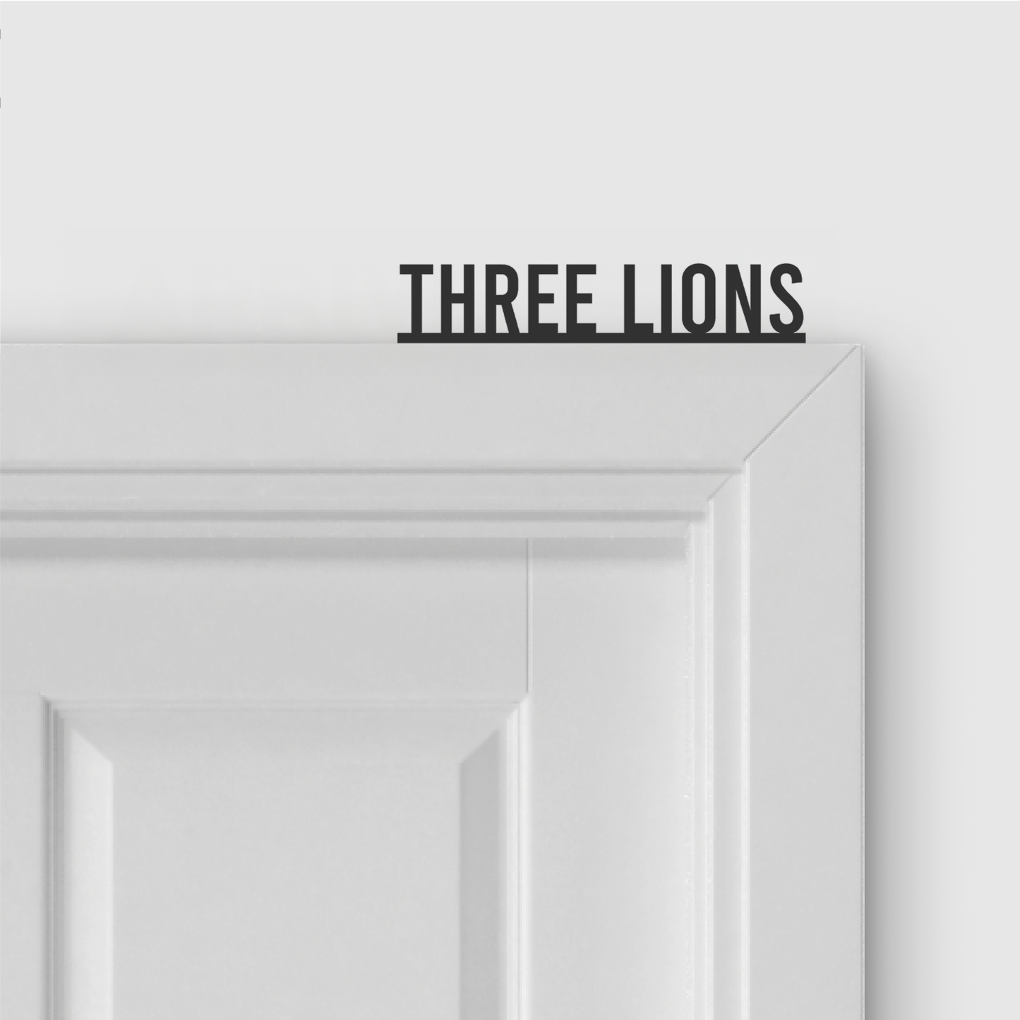THREE LIONS door topper in Condensed font style