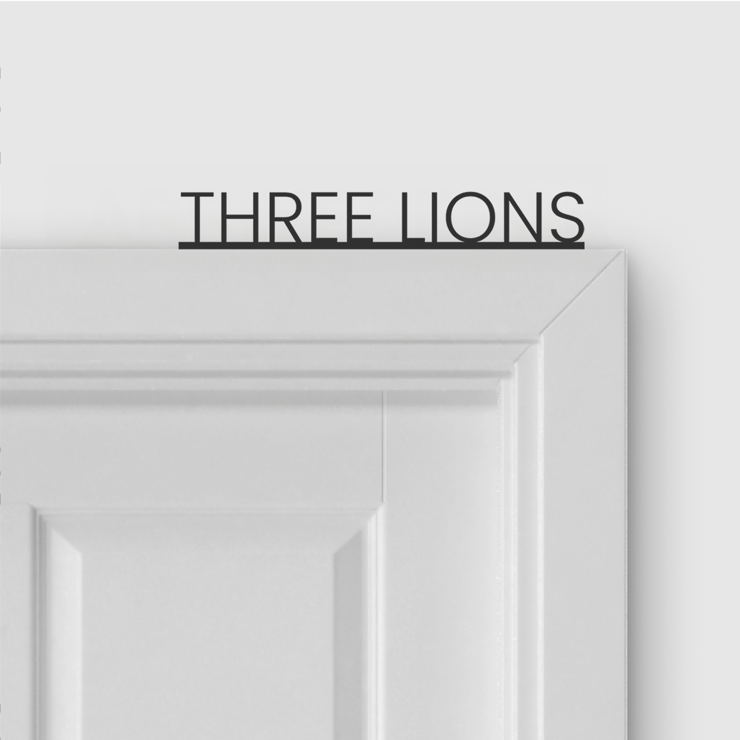THREE LIONS door topper in Thin font style